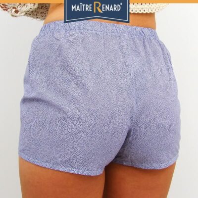 Caleçons femme pétales blancs sur fond bleu en voile de coton