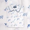 Pyjama court garçon deux pièces chemise et short en coton motif Dauphins.