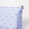 Trousse de toilette crabes en coton enduit.